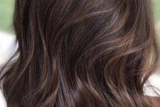 30 long and luxurious dark brunette hair with subtle caramel balayage is a chic and very beautiful solution
