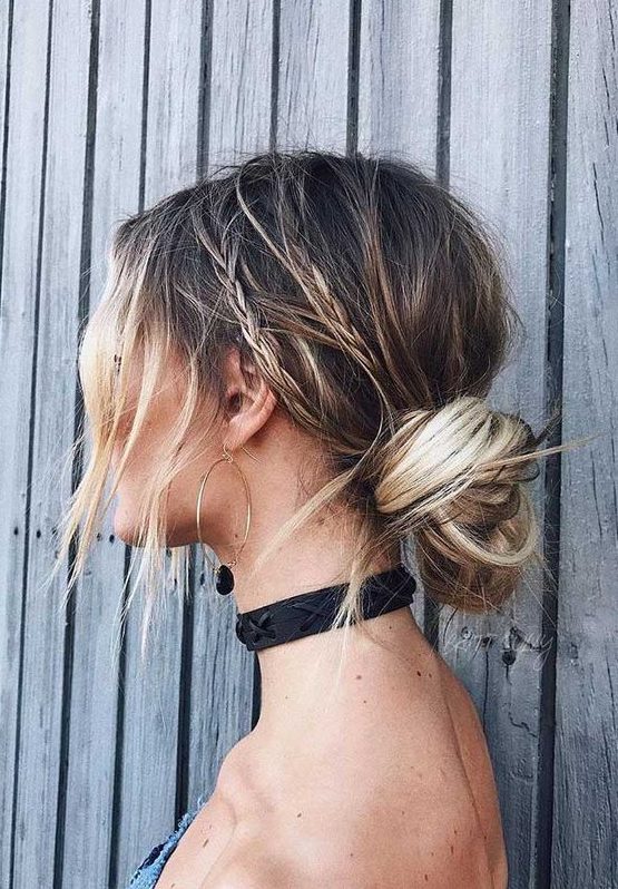 a double braid, a messy twisted and braided low bun plus wavy locks down for a bold party look
