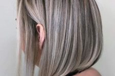 a long dark bob with silver and grey balayage that creates a bold look and hides natural greys in a pretty way