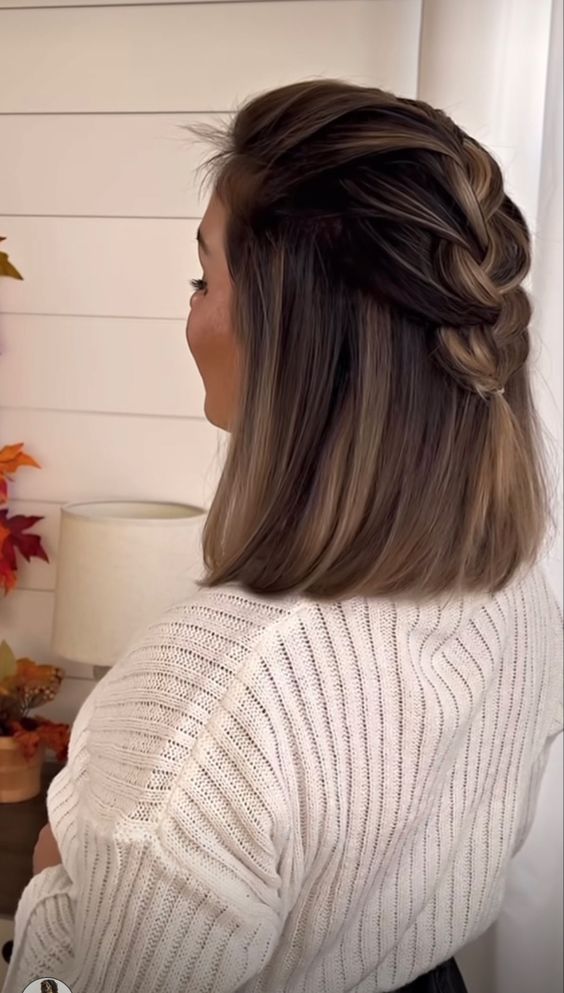 a lovely half updo with a braid on top and straight hair down is a super chic idea for every day