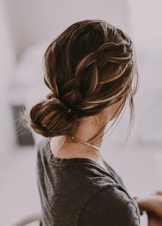 a low bun with a large sided braid is a comfy and long-lasting hairstyle with a casual feel