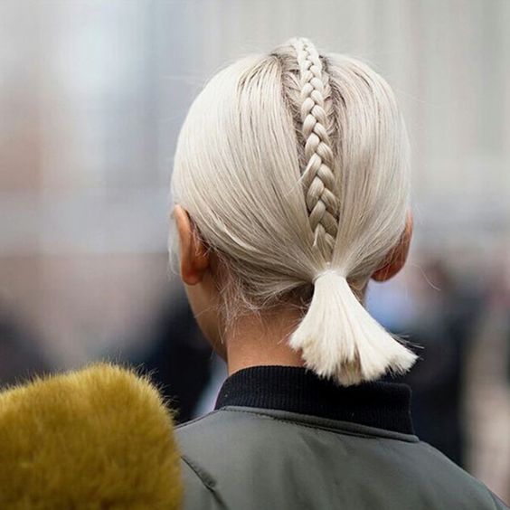 a low ponytail with a braid on top is a catchy and creative idea to rock for a modern look