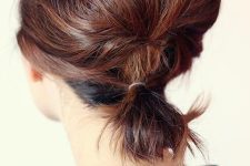 a low ponytail with a bump secured with a bobby pin is a lovely and fast idea to realize