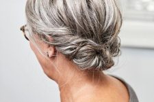 a messy twisted low updo plus a bump on top looks elegant and stylish for a special occasion
