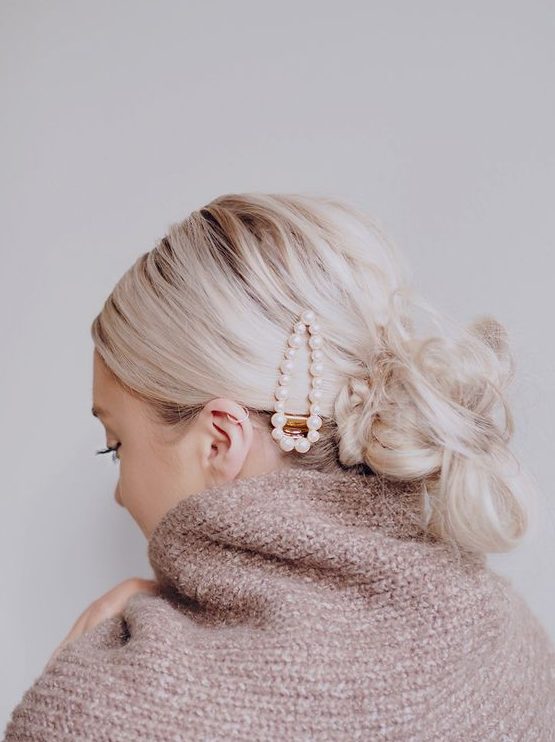 a pearl hair barrette is a nice idea that is on right now, every fashionista is trying that