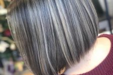 a stylish blunt bob with grey accents and highlights is a cool and catchy idea for a lovely look