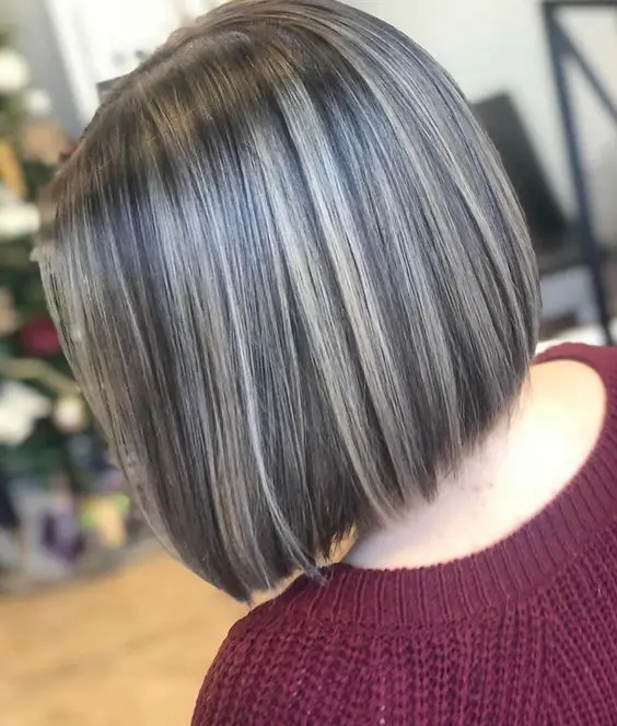 a stylish blunt bob with grey accents and highlights is a cool and catchy idea for a lovely look