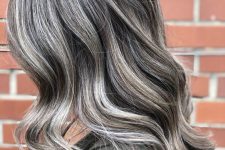 medium-length dark hair all done with grey balayage to blend in natural greys in a beautiful way