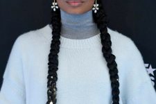 two long braids accented with pearls and pearl earrings are a great hairstyle for Christmas