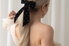 02 a classy curled low ponytail with a sleek top and an embellished black velvet bow is amazing
