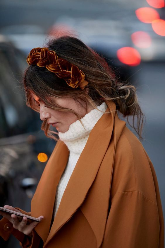 a lovely braided orange velvet headband that matches the coat and adds color to the look