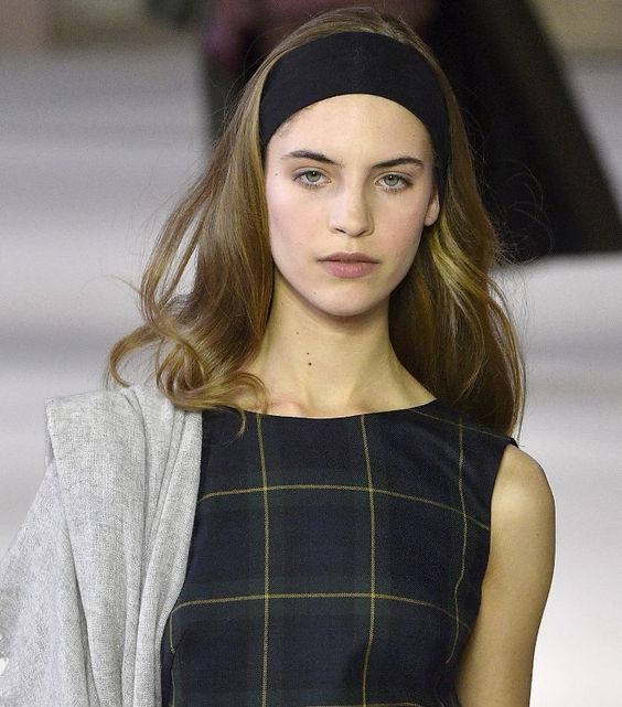 A wide black headband is a stylish idea, it's sport inspired and is perfect for 2nd day hair