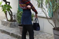 23 a bold look with a patterned jumper, a navy denim mini, black tights, red shoes and a black bag