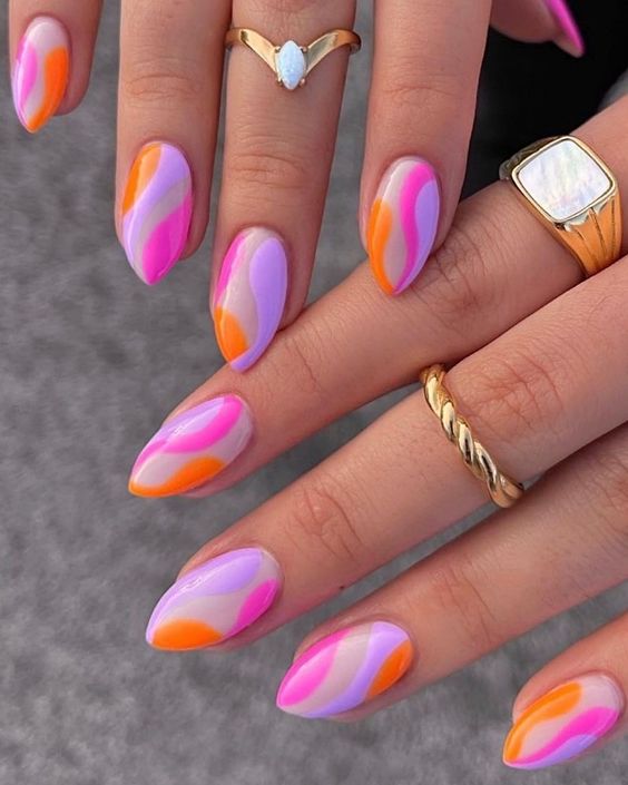 a colorful swirl stiletto manicure is a gorgeous solution for a bright spring or summer look