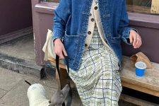 26 a fun eclectic grandpa outfit with a plaid midi dress, a creamy cardigan, a denim jacket and white and green sneakers