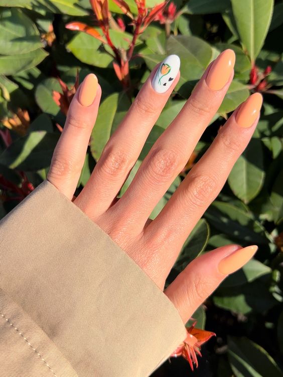 Peach Fuzz nails with an accent floral finger are amazing for spring or summer, they are bright and cool