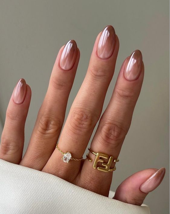 a beautiful almond ombre manicure from nude to brown is a stylish idea that looks all-natural