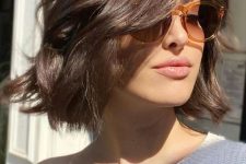 a beautiful dark brown wavy and messy bob is a cool idea to wear with casual looks, it’s effortless