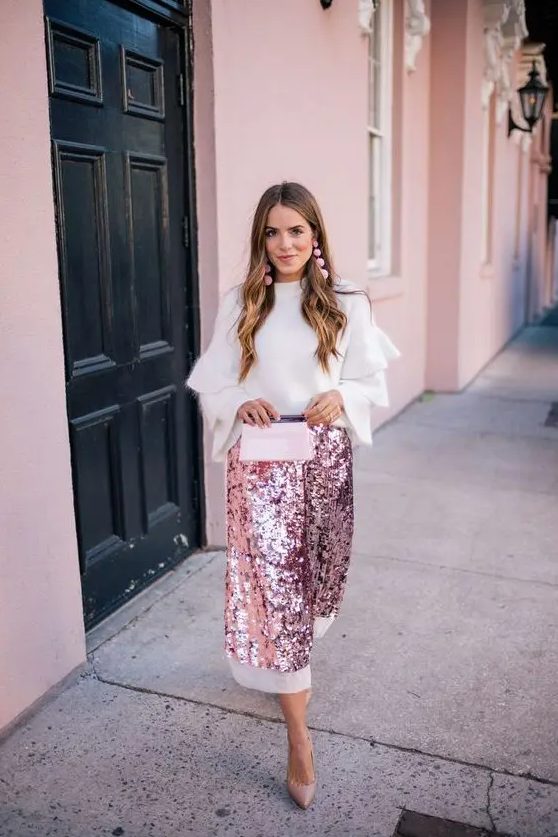 A beautiful white and pink sequin A line midi skirt is an unusual and cool idea to wear to a party