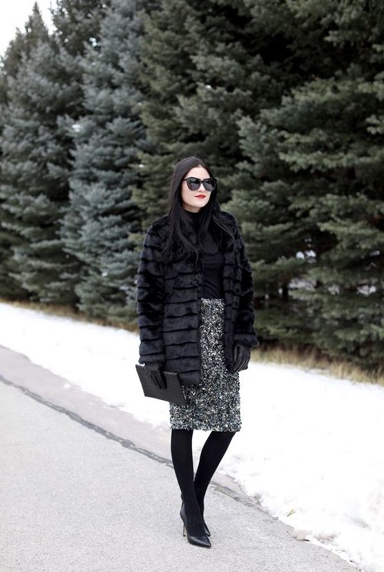 a black top, a black sequin pencil skirt, black tights, black shoes and a faux fur coat plus a clutch
