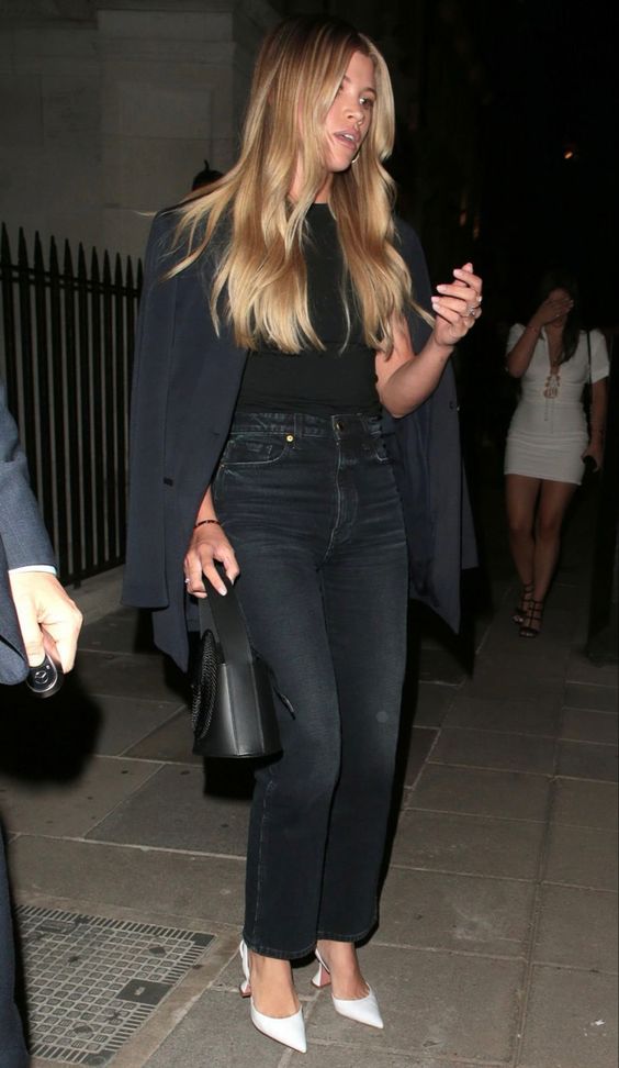 a black top, black blazer, black straight jeans, a black bag and white slingbacks for a simple and cool quiet luxury look