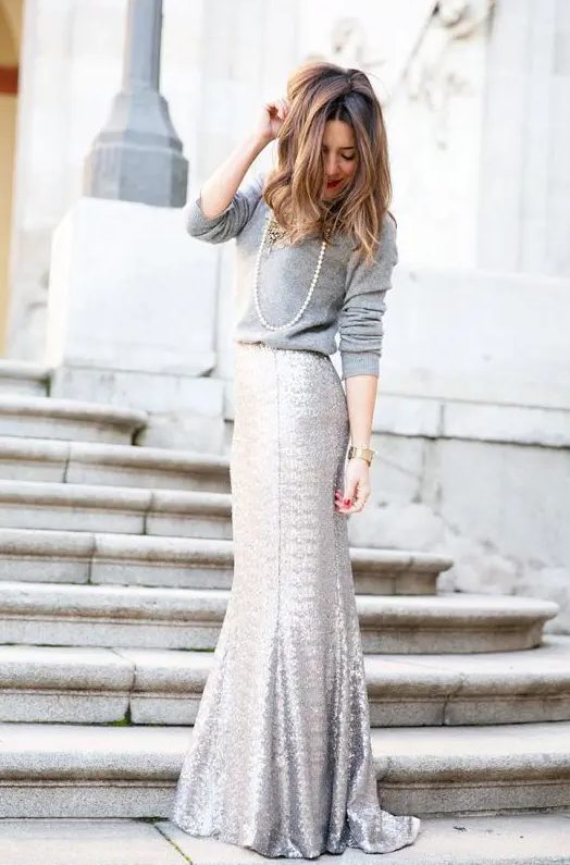 a chic and glam winter bridal shower outfit with a silver sequin maxi, a grey sweater and a strand of pearls