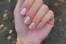 a classy chrome nuse manicure on short nails of a square oval shape is amazing for a modern bride