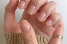 a classy nude square manicure with white stripes is a cool and catchy idea for a modern look