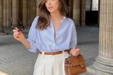 a classy summer old money look with a blue striped shirt, neutral Bermuda shorts, a brown belt and a brown mini bag