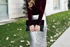 a deep purple velvet top with long sleeves, a silver sequin maxi skirt and a black clutch for a breathtaking look
