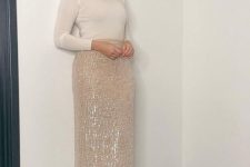 a delicate pre-wedding look with a white long sleeve top, a creamy sequin maxi, nude shoes is a gorgeous idea