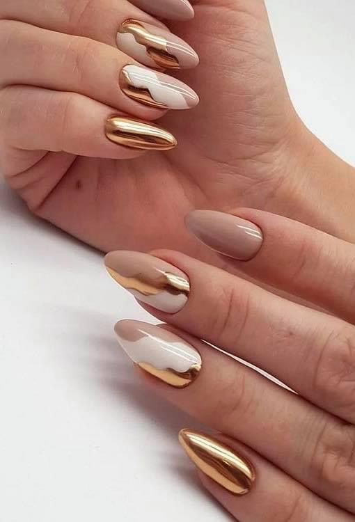 a fantastic nude, gold and white abstract manicure is a very chic and glam idea for a glam modern bride