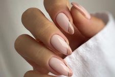 a fresh take on French manicure, with silver strapes and taupe tips is a cool idea fro a modern look