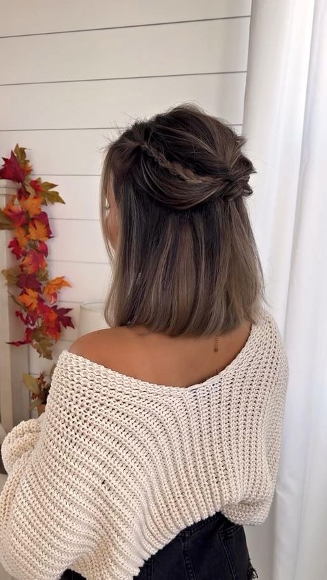 a half updo of a long bob, with a bump and some littel braids on top is a cool and catchy idea