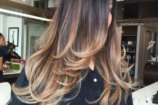 a long layered haircut with ombre to highlight the locks and layers even more