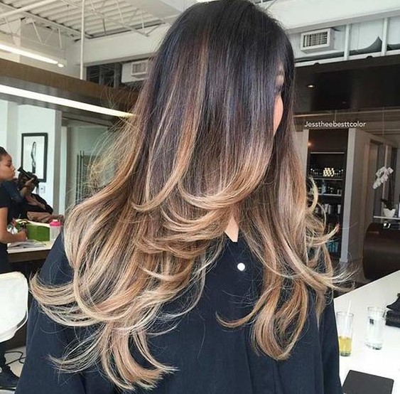 a long layered haircut with ombre to highlight the locks and layers even more