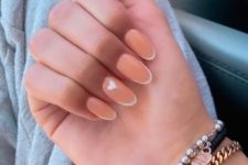 a lovely Peach Fuzz French manicure with small tips is a super fresh and cool idea for spring or summer