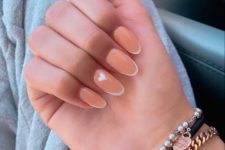 a lovely Peach Fuzz French manicure with small tips is a super fresh and cool idea for spring or summer