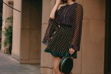 a lovely feminine look with a polka dot mini dress, Mary Jane shoes and a green round bag is chic and cute