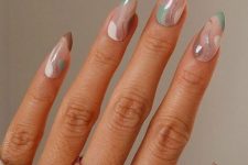 a lovely swirl manicure in taupe, green, white and silver glitter is amazing for fall, it looks very trendy
