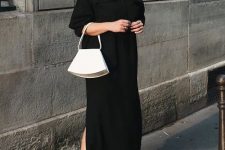 a minimalist look with a black maxi shirtdress, black lace up shoes and a white bag for a chic minimal look