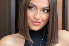 a pretty light brown long bob with straight hair is a stylish and chic idea, it looks elegant and modern