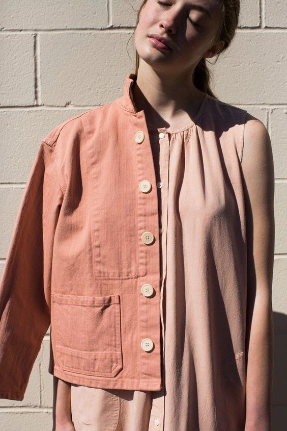 a retro blush button down sleeveless dress paired with a Peachy Fuzz denim jacket are a cool look