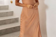 a romantic Peach Fuzz midi dress with a deep neckline and ruffle sleeves is a cool idea for a special date