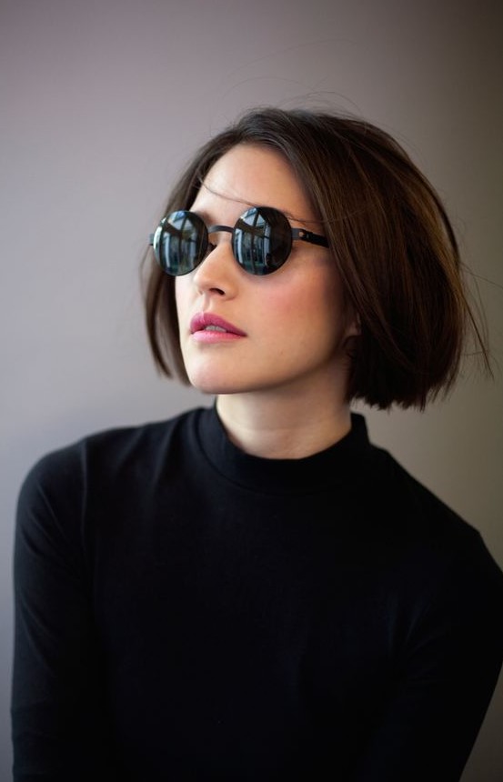 a short brown blunt bob with a lot of volume and a bit of texture is a cool solution that looks edgy