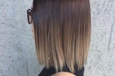 a shoulder-length bob with ombre, from dark brown to bronde, straight and with volume, is a super cool idea