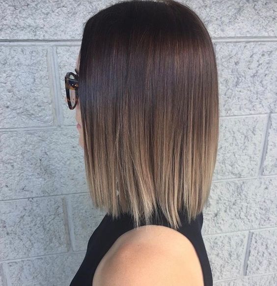 a shoulder-length bob with ombre, from dark brown to bronde, straight and with volume, is a super cool idea