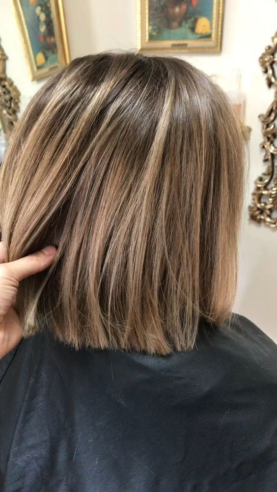 a stylish and volumetric light brunette bob with lighter bronde locks is a cool and catchy idea to rock