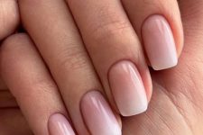 a stylish short square manicure, a modern version of French nails done in an ombre technique is cool