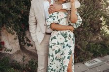 a stylish white floral midi dress with an off the shoulder neckline and sheer shoes for a spring wedding